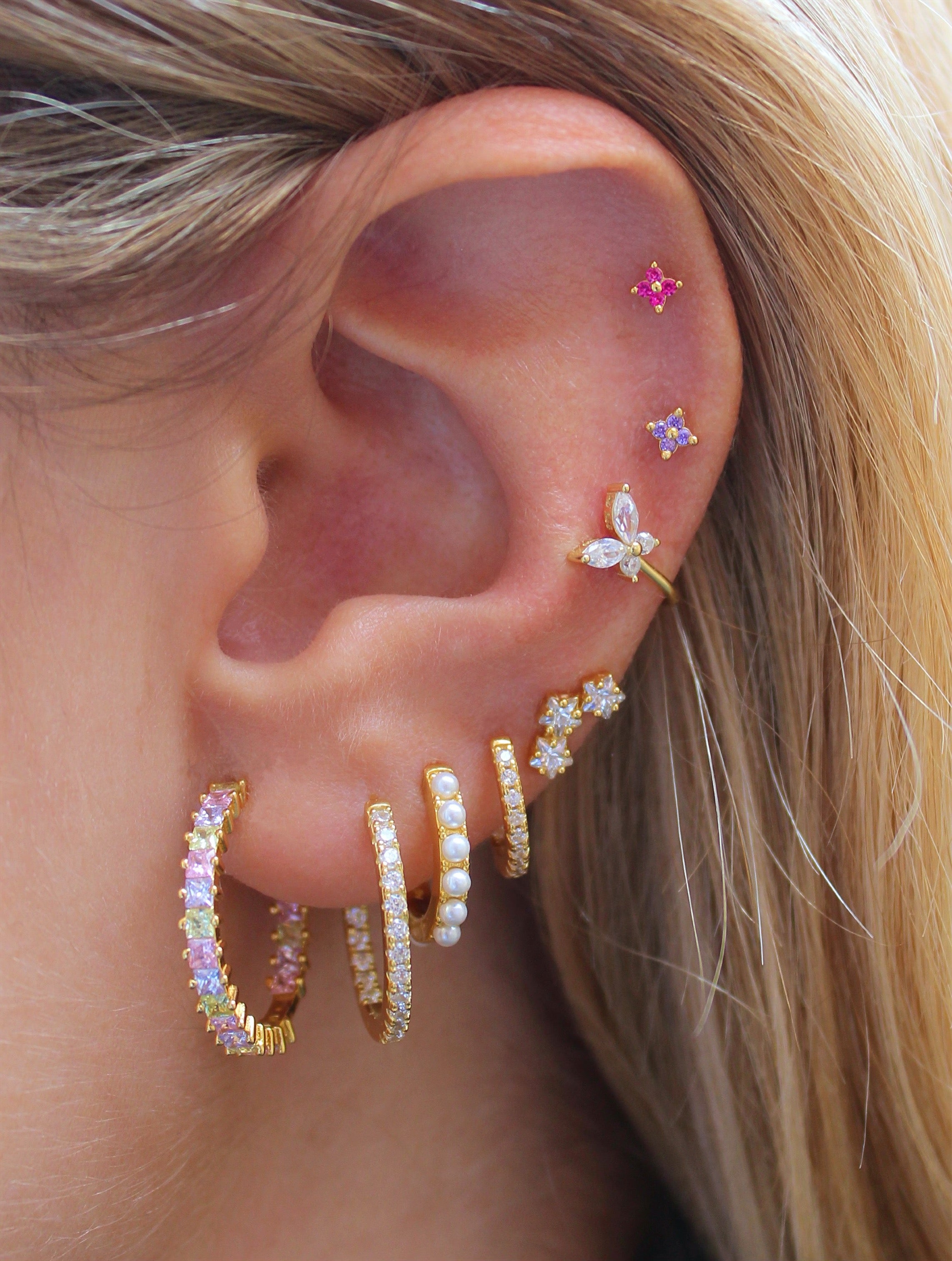 Piercing Flor Oro Violeta