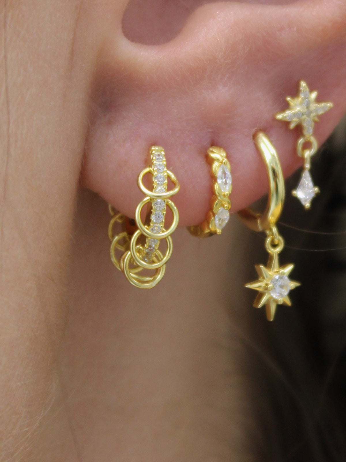 Cosmic Star Charm Hoops in Gold